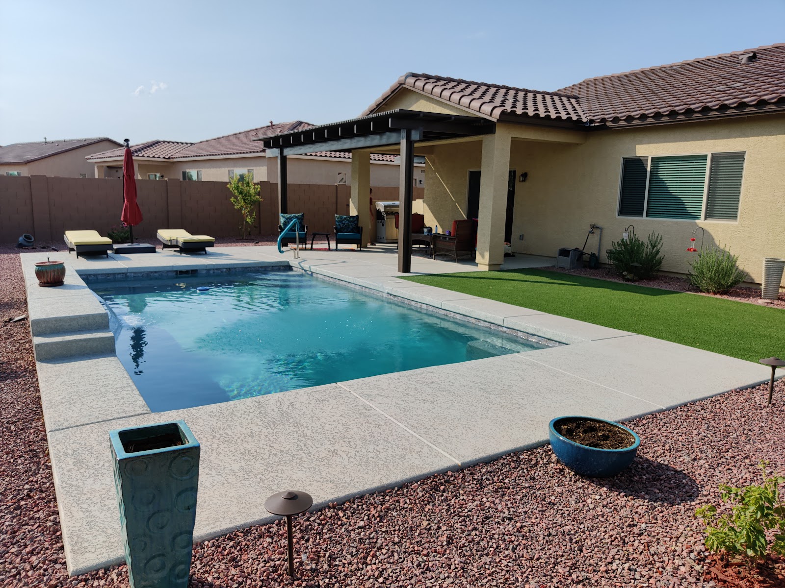 Full Backyard Oasis with Pool and Travertine in Goodyear